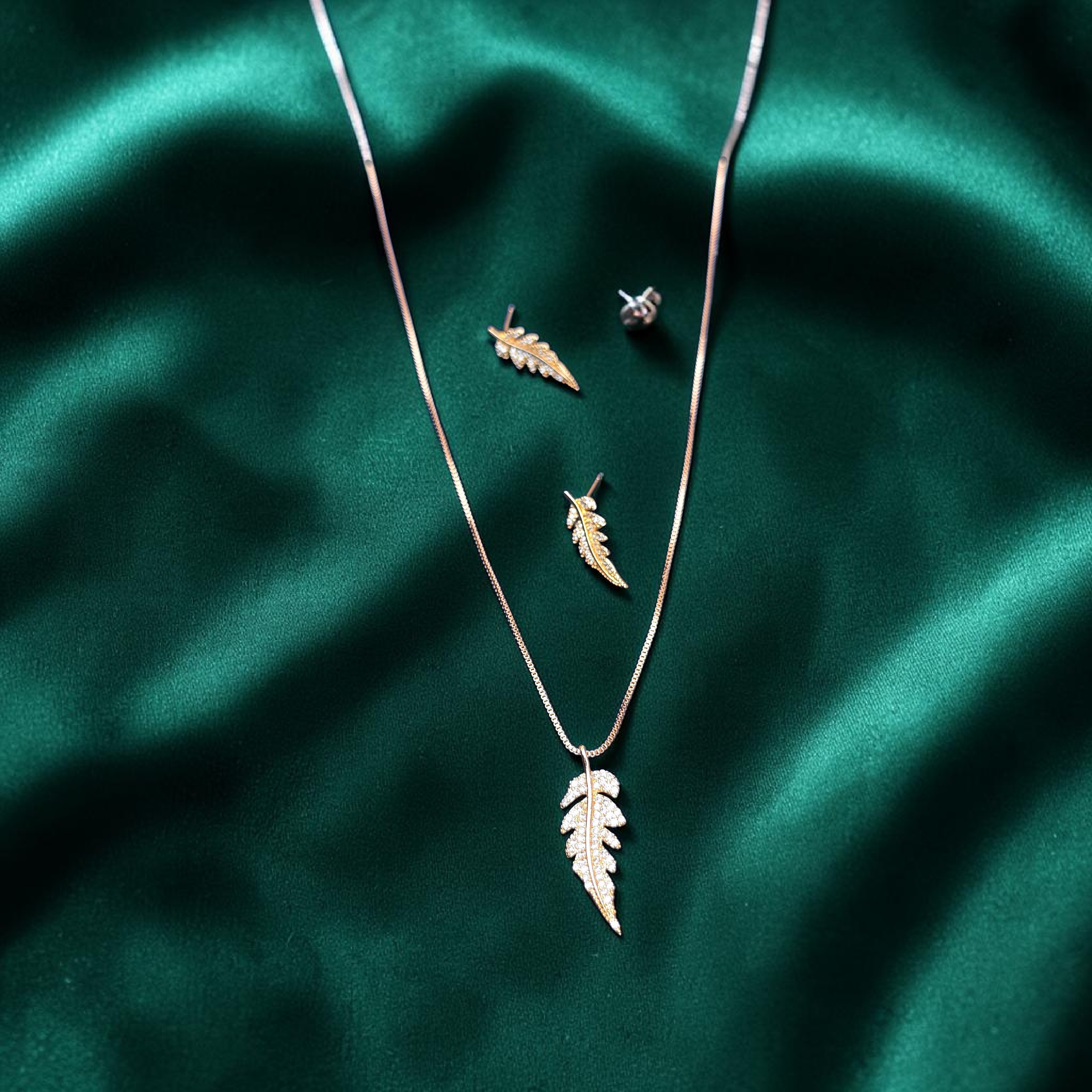 Barsava Minimalist Feather shaped Pendant set in Rose Gold Finish