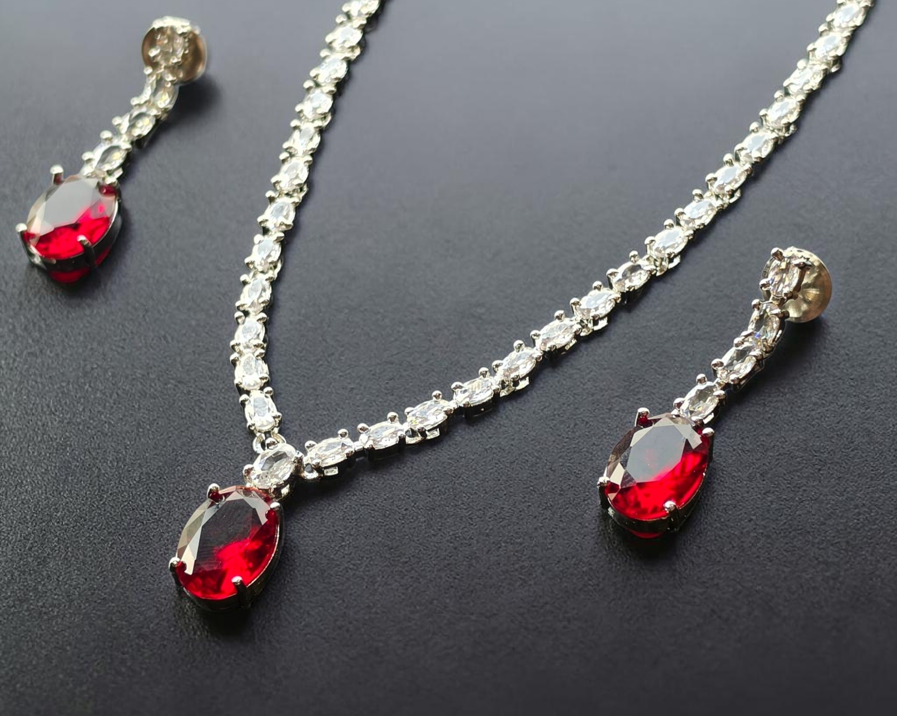 Elegant Crystal Necklace & Drop Earrings Set with Ruby Red Teardrop Stones