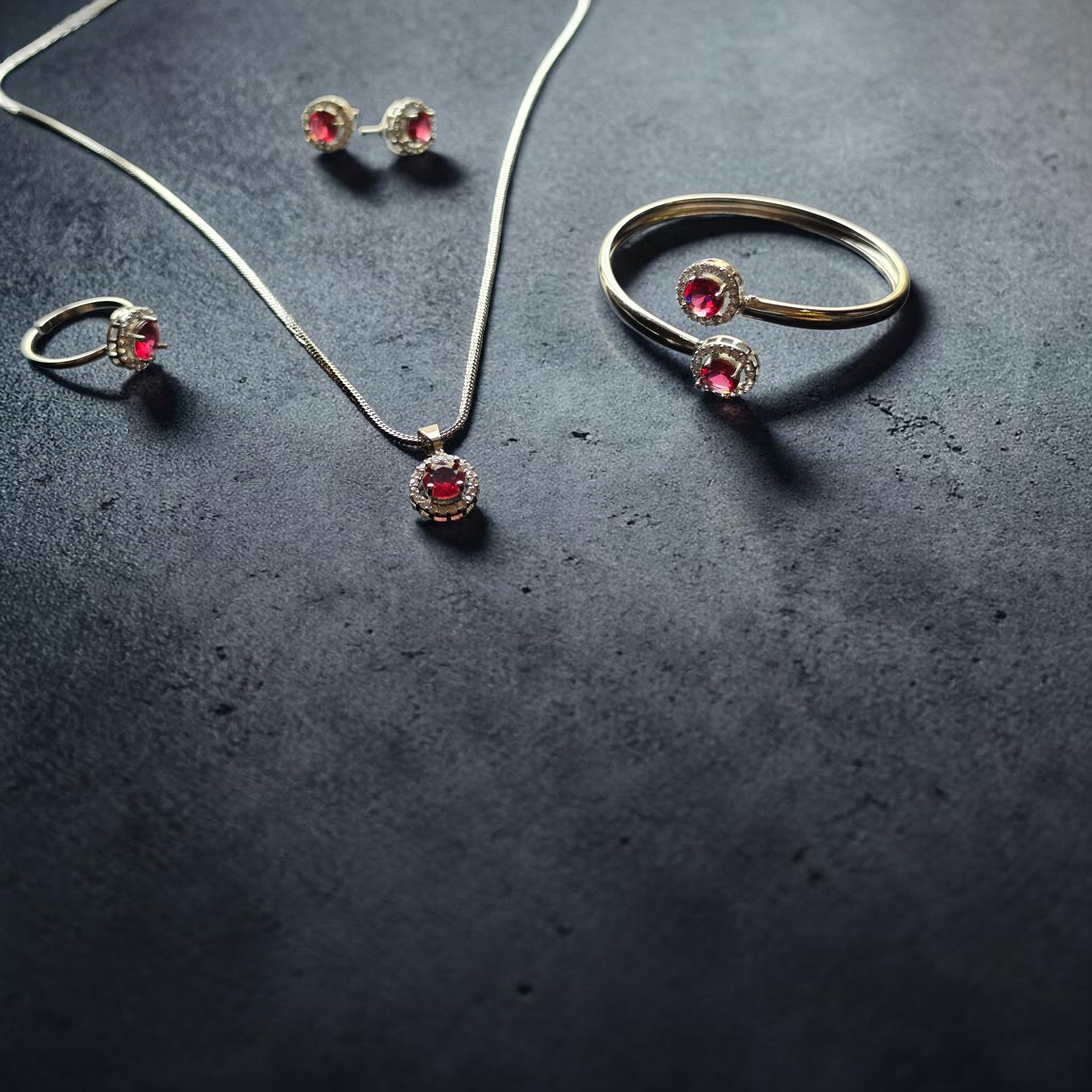Elegant Ruby Halo 4-Piece Jewelry Set – Pendant Necklace, Ring & Earrings